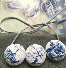 Borduurwerk met een verhaal en een boom, een boot en een pagode ….